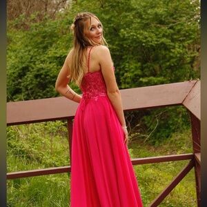 Bright pink Morilee prom dress